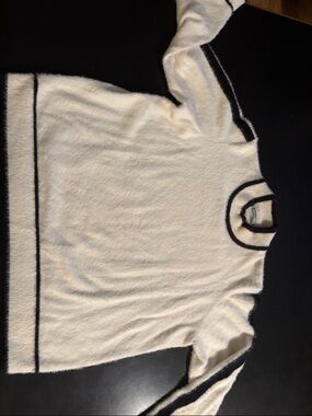 Cozy Ivory Cowl Neck Sweater with Black Trim